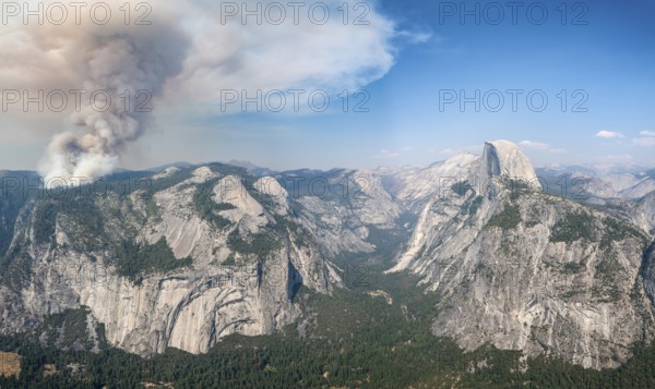View from Glacier Point to Yosemite Valley with Half Dome, Forest fire with smoke, Yosemite National Park, California, USA