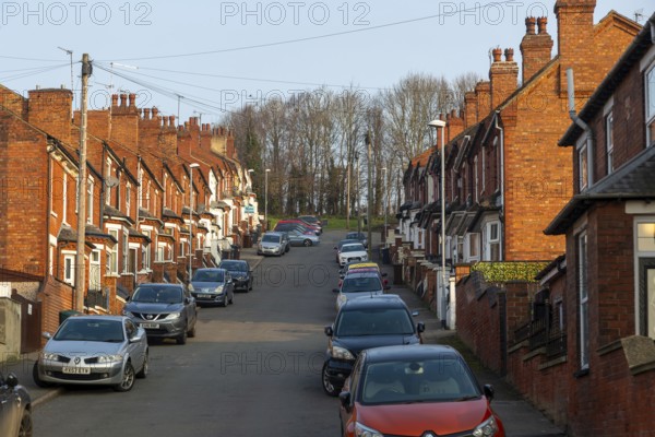 Victorian terraced housing with small front gardens, Fairfield Street, inner city of Lincoln, Lincolnshire, England, UK