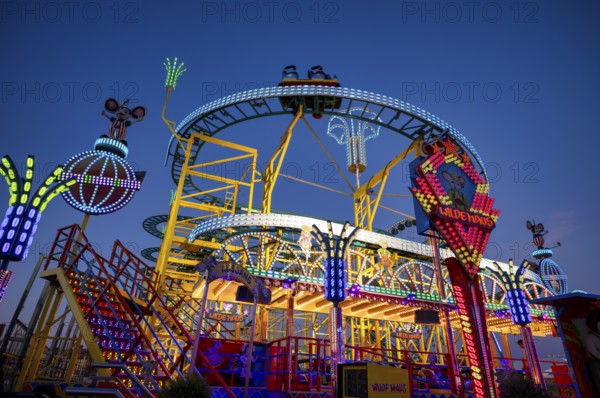 Rollercoaster Wild Mouse, rides, neon lights, Cannstatter Wasen, blue hour, funfair, spring festival, folk festival, Bad Cannstatt, Stuttgart, Baden-Württemberg, Germany