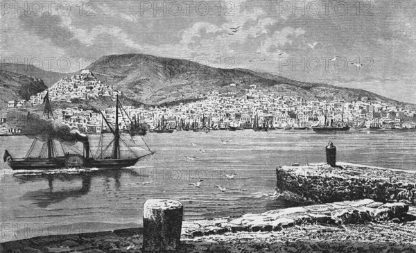 A smoking steamship passes the town of Ermoupoli on the Cyclades island of Syros or Siros, sailing ships in the harbour, houses on the hillside, mountain landscape, geography, Greece, historical illustration 1888
