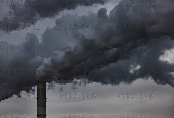 Pollution, industry, smoke pouring out of a factory chimney, Lenzing, Upper Austria, Austria