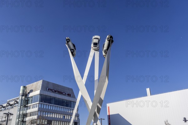 Inspiration 911 artwork by Gerry Judah: three steles, each presenting a Porsche 911 at a height of up to 24 metres. Company headquarters at Porscheplatz, Zuffenhausen, Stuttgart, Baden-Württemberg, Germany