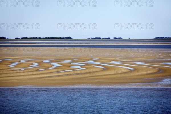 Schleswig-Holstein Wadden Sea National Park at low tide with sandbanks and mainland, North Frisia, Germany