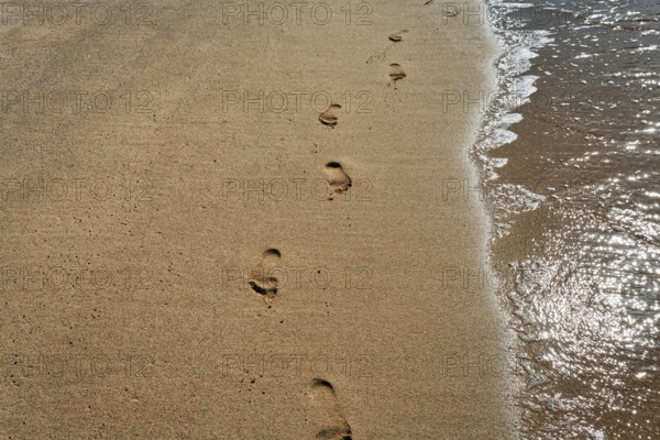 Footprint in the sand, on the shore, Simos beach, evening light, text free space, symbol photo, walk, moment, transience, Elafonisos, Ionian Sea, Greece