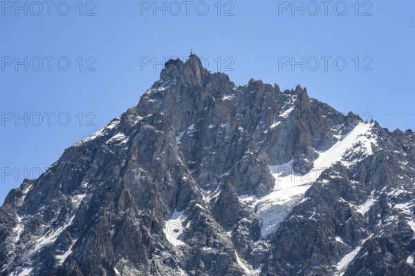 Steep rocky mountain peak, summit of the Aiguille du Midi, Chamonix, Haute-Savoie, France