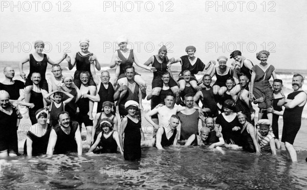 Bathing group on the beach, in the water, piggyback, couples, funny, laughing, summer holidays, holiday, joie de vivre, about 1920s, Baltic Sea, Binz, Rügen, Mecklenburg-Western Pomerania, Germany