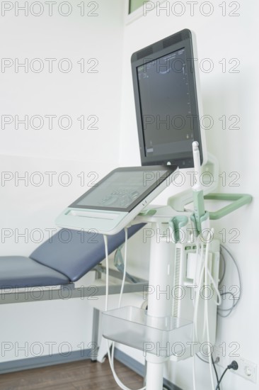 Modern ultrasound machine in a medical environment with monitor and control unit, Urology, Germany