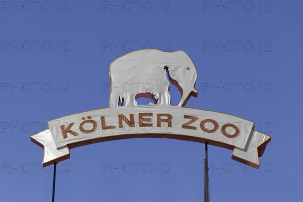 Cologne Zoo 165 years, anniversary sign covered with fabric in front of a blue sky, Cologne, North Rhine-Westphalia, Germany