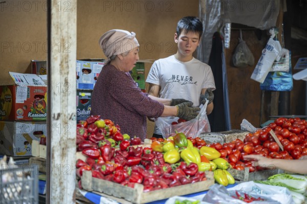 Stall selling vegetables at the Osh Bazaar, Bishkek, Kyrgyzstan