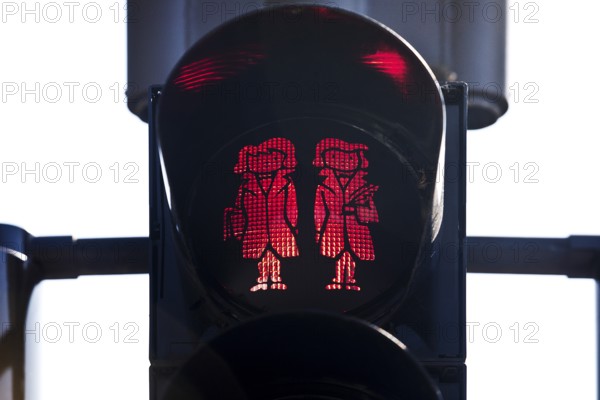 Pedestrian traffic light with red Brothers Grimm Ampelmännchen, Hanau, birthplace of the brothers, Hesse, Germany