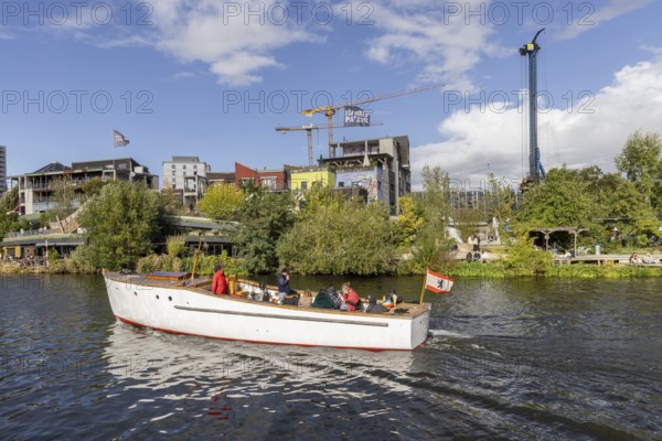 Holzmarkt 25, urban neighbourhood in Berlin-Friedrichshain. Internationally recognised example of user-driven urban development. Park with a popular view of the riverside, unconventional bars and food stalls. Cityscape Berlin, Germany