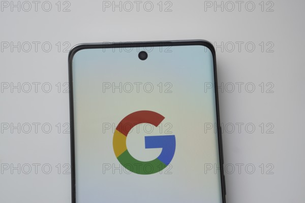 The logo of the Google is displayed on a smartphone screen