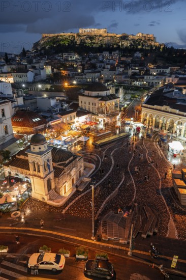 View over the old town of Athens, with Panagia Pantanassa Church, Tzisdarakis Mosque and Acropolis, illuminated Monastiraki Square, blue hour, Athens, Attica, Greece