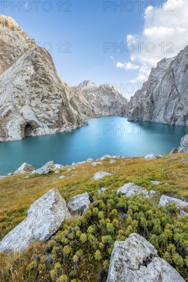 Turquoise mountain lake Kol Suu with rocky steep mountains, Kol Suu Lake, Sary Beles Mountains, Naryn Province, Kyrgyzstan