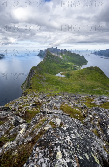 View of fjords Øyfjorden and Mefjorden, mountains on the headland of Fjordgård, view from Barden mountain, Senja, Norway