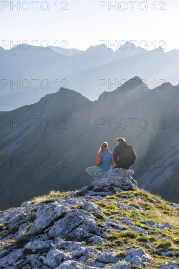 Hiker enjoying the mountain panorama in the morning, Venedigergruppe, Hohe Tauern, Austria