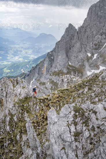 Mountaineer with helmet, ascent to the Ackerlspitze, Wilder Kaiser, Kaiser Mountains, Tyrol, Austria