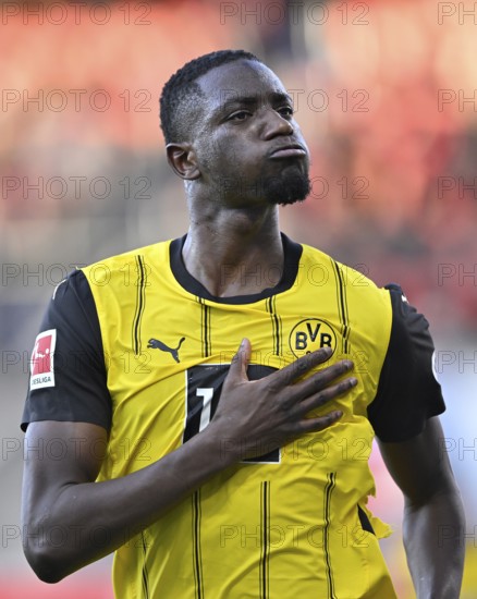 Goal celebration Serhou Guirassy Borussia Dortmund BVB (09) gesture hand on chest, coat of arms, Voith-Arena, Heidenheim, Baden-Württemberg, Germany