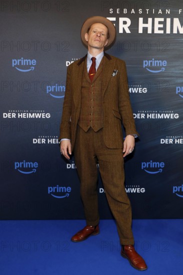 Alexander Scheer at the premiere of FITZEKS DER HEIMWEG at the Delphi Filmpalast in Berlin on 14 January 2025