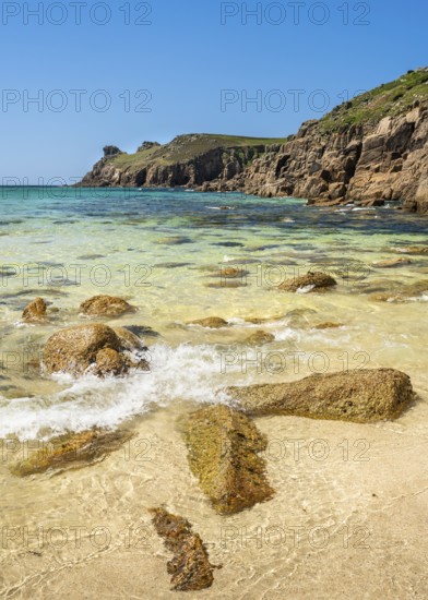 Sandy beach beach and rocks in Nanjizal Bay or Nanjizal Beach. St Just, Penzance, Cornwall, England, Great Britain