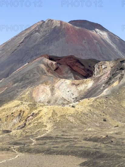 On the hiking trail of the Tongariro Alpine Crossing in Tongariro National Park with a view of the volcano Mount Ngauruhoe, North Island, New Zealand, Oceania