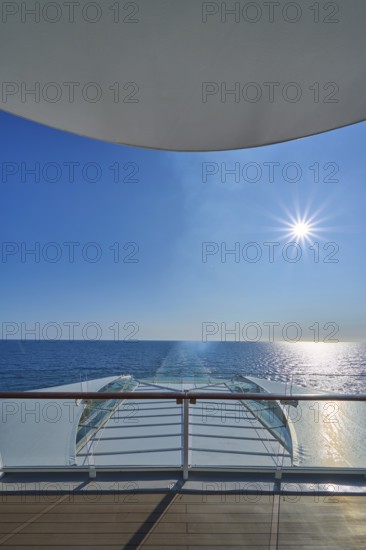 View from the ship's deck, Mein Schiff 6, of the vast sea under bright sunshine and blue skies, North Sea, Norway