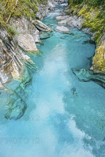 View of the blue pools on the Marokopa River, Haast Pass, Mount Aspiring National Park, Otago Region, South Island, New Zealand