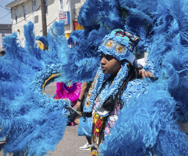 New Orleans, Louisiana - The Mardi Gras Indians' Super Sunday parade. African-Americans create elaborate costumes for the annual event to honor Native Americans who, during slavery, helped helped people escape and gave them refuge