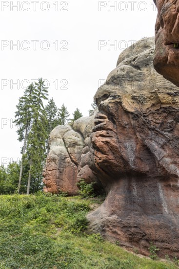 Natural monument Kelchsteine near Oybin, viewed from the side the Kelchstein guardians look like heads with faces, Zittau Mountains, Saxony, Germany