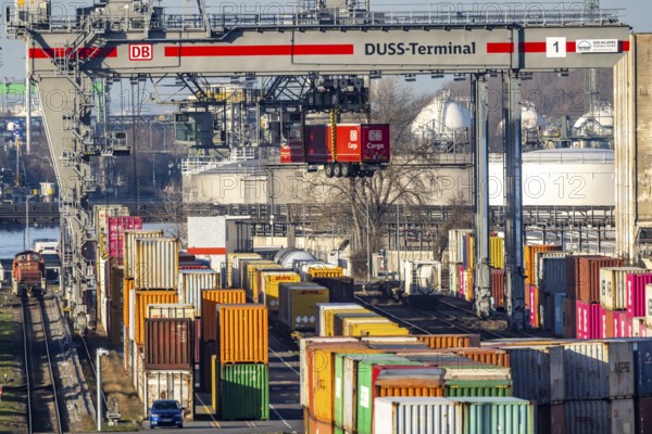 The port of Mannheim is one of the most important inland ports in Europe. The harbor basins stretch across the Rhine and Neckar. DUSS Terminal Deutsche Bahn AG with container from DB Cargo in the Mühlauhafen container terminal. Mannheim, Baden-Württemberg, Germany