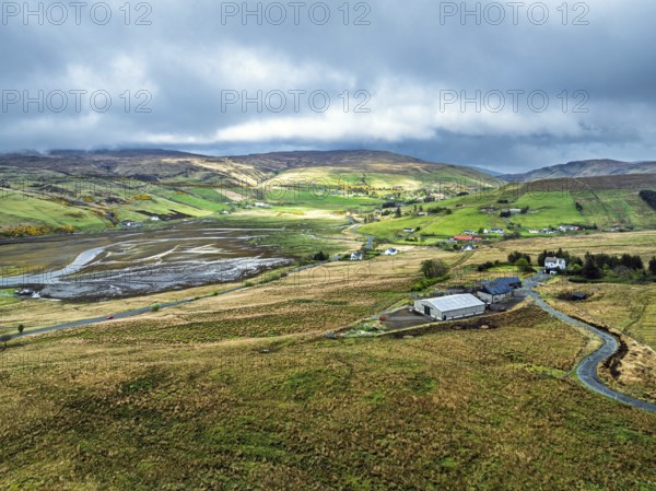 Farms and Moors over Loch Harport from a drone, Drynoch, Isle of Skye, Highlands, Scotland, United Kingdom