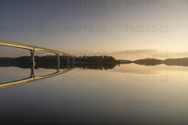 Morning atmosphere, Lövö bridge reflected in the water, Kasnäsintie, Falkö Fjord, Kasnäs, Hitis archipelago, archipelago south of Turku, Finland