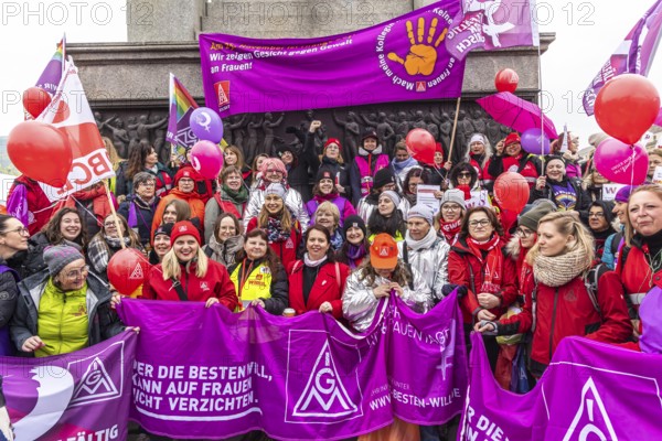 DGB woman proclaim international solidarity at a trade union rally. The trade unionists wear purple waistcoats. They also defend themselves against violence against woman. Schlossplatz, Stuttgart, Baden-Württemberg, Germany
