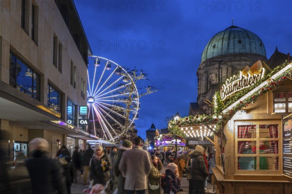 Ferris wheel at the winter village, Christmas market at dusk, St Elisabeth's Church on the right, Jakobsplatz, Nuremberg, Middle Franconia, Bavaria, Germany