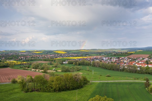 Aerial view with rainbow, city view of Duderstadt, in the foreground the district Gerblingerode, Lower Saxony, Germany