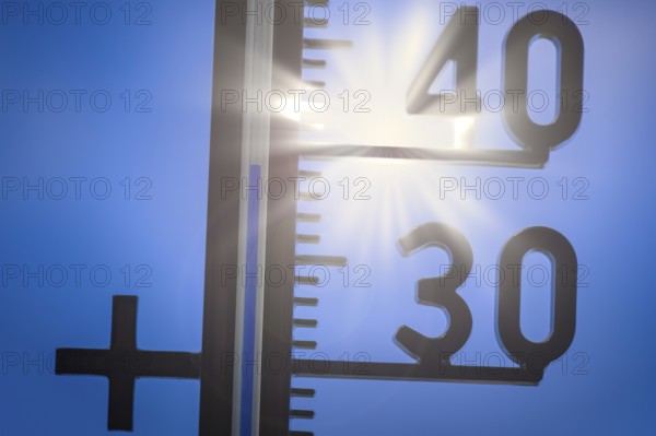 Symbolic image, global warming, A thermometer shows a high temperature under a bright sun in a clear sky Sun, heat wave, Baden-Württemberg, Germany