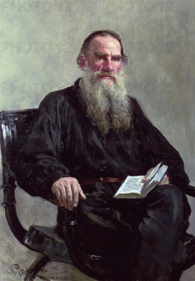 Leo Tolstoy, 1887, oil on canvas. Ilya Repin (1844-1930), Russian painter. Tolstoy (1828-1910), Russian writer, philosopher and mystic, sitting in an armchair, book in hand. His works include War and Peace and Anna Karenina. Beard