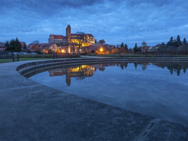 Castle hill with collegiate church St. Servatius with reflection in water basin in the evening, UNESCO World Heritage Site, Quedlinburg, Saxony-Anhalt, Germany