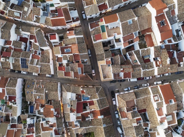 Streets and rooftops in the White Town of Olvera. Aerial view. Drone shot. Cádiz province, Andalusia, Spain