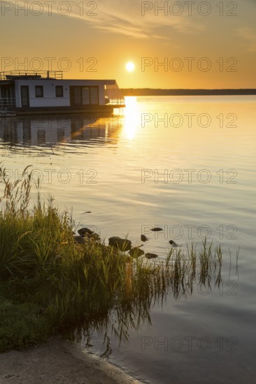 Sunrise at the floating houses on Gräbendorfer See near Laasow, Vetschau im Spreewald, Brandenburg, Germany