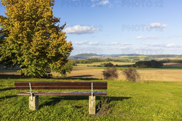 Bench with a view of Löbauer Berg and the Upper Lusatian Highlands in Kottmarsdorf, Kottmar, Upper Lusatia, Saxony, Germany