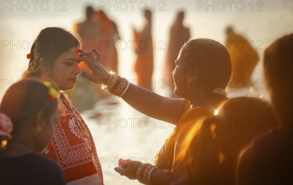 Hindu devotees perform rituals as they offer prayers to the Sun god in the bank of Brahmaputra river on the occasion of the 'Chhath Puja' festival in Guwahati, Assam, India on 7 November 2024. Chhath Puja is a significant Hindu festival celebrated primarily in the Indian states of Bihar, Jharkhand, Uttar Pradesh, and in Nepal. Dedicated to the worship of the Sun God (Surya) and his wife Usha (also referred to as Chhathi Maiya), this festival seeks blessings for prosperity, health, and longevity