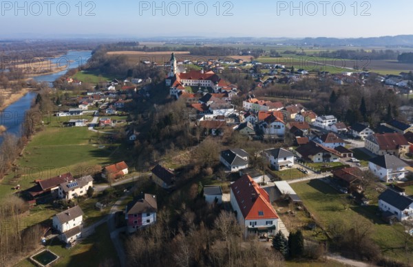 Drone shot, view of the village with Augustinian monastery Reichersberg, Reichersberg, Innviertel. Upper Austria, Austria