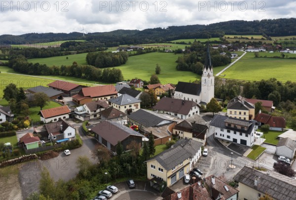 Drone shot, view of village with church, Sankt Marienkirchen am Hausruck, Hausruckviertel, Upper Austria, Austria