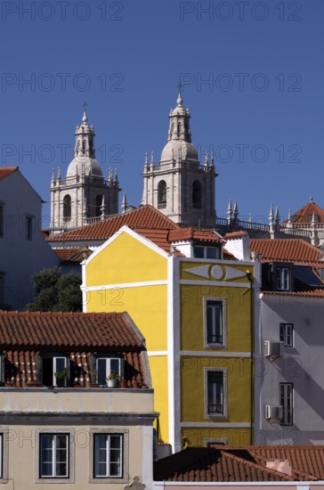 View from the viewpoint Miradouro de Santa Luzia, church Igreja de Santo Estêvão, city view, Alfama, Lisbon, Portugal