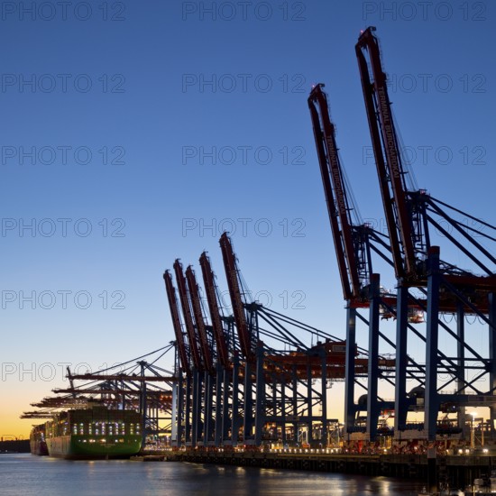 Container Terminal Burchardkai, abbreviated CTB, HHLA's largest terminal in the Port of Hamburg in the evening, Hamburg, Germany