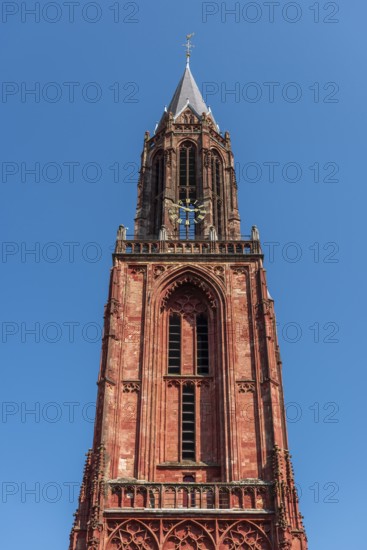 Maastricht, Netherlands, The Protestant Sint Janskerk rises against a clear blue sky