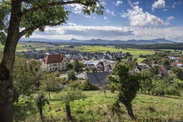 View from the viewing terrace of the town of Aach in Hegau with a view of the volcanic cones Hohentwiel, Hohenkrähen, Mägdeberg and Hohenstoffeln, district of Constance, Baden-Württemberg, Germany