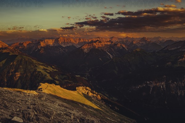 Thaneller summit at sunset in the Lechtal valley in Tyrol with a wonderful view of the surrounding mountains. Tyrol, Austria