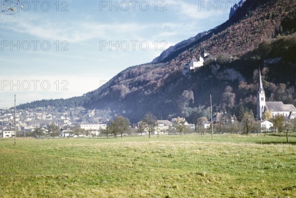 Vaduz Castle and St. Florin Cathedral, Vaduz, capital city of Liechtenstein, Europe 1960